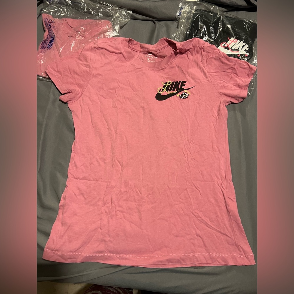 Nike pink shirt.